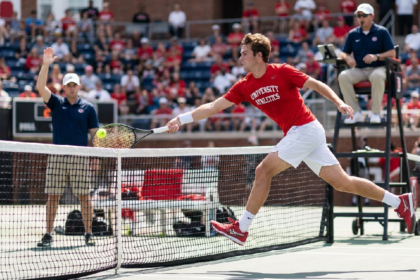 College tennis leaping shot goes viral despite net violation