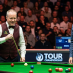 John Higgins beats Mark Williams to reach Tour Championship quarters