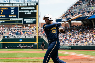 West Virginia wins first College World Series game 7-5 against Troy