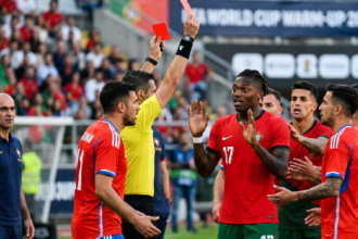 Rafael Leão sent off for punching Iván Román in Portugal's 2-1 win