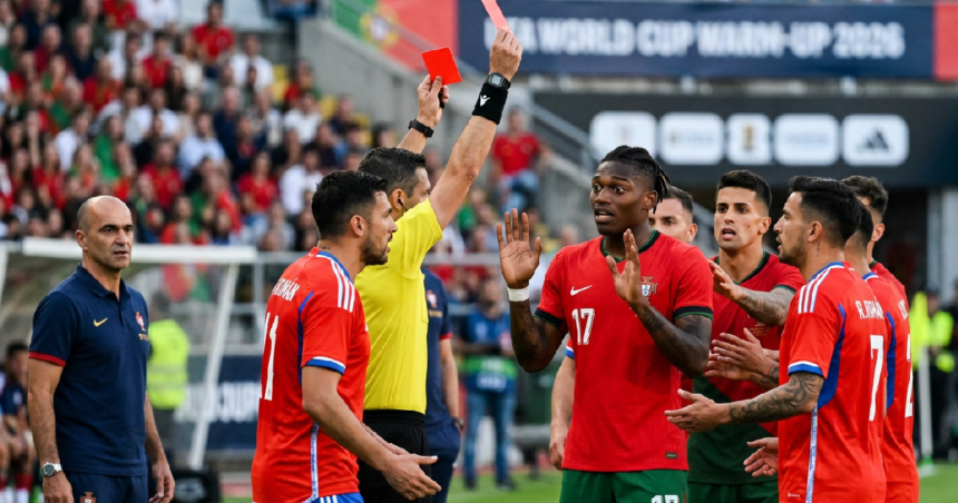 Rafael Leão sent off for punching Iván Román in Portugal's 2-1 win